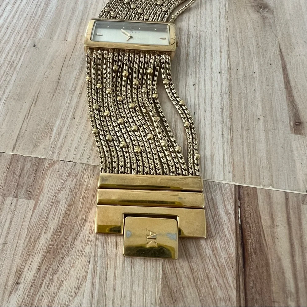 Anne Klein ladies gold tone multi strand bracelet watch NEW BATTERY